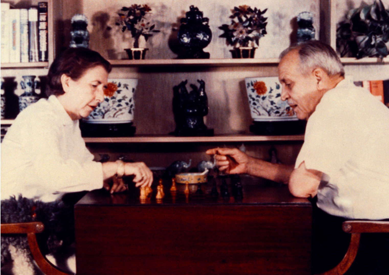 John and Catherine MacArthur playing chess together.